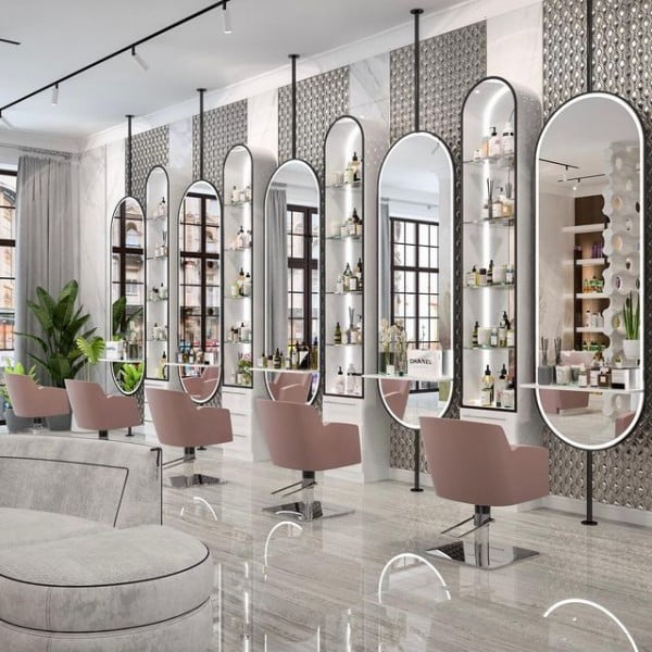 Repetition of Soft Shapes and Pop of Pink salon mirror