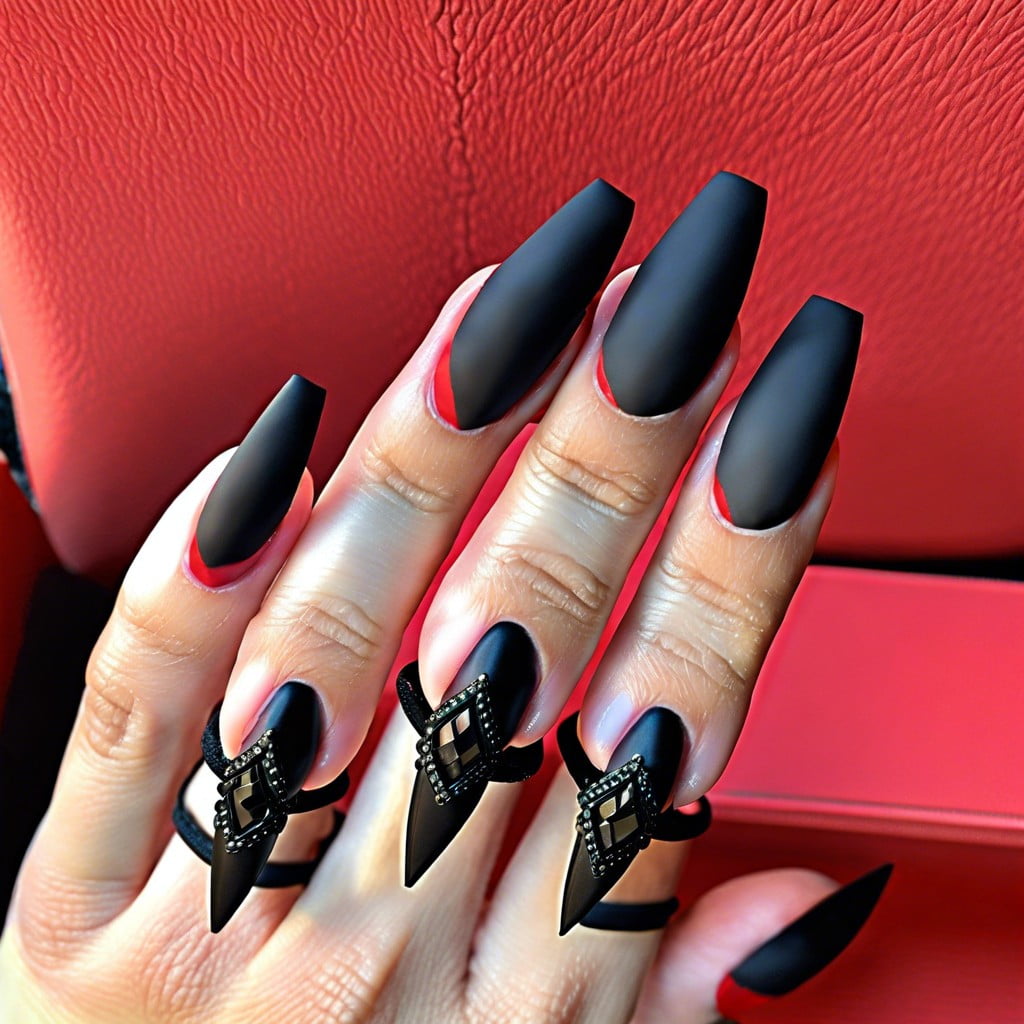 matte red coffin nails paired with a shiny black french tip