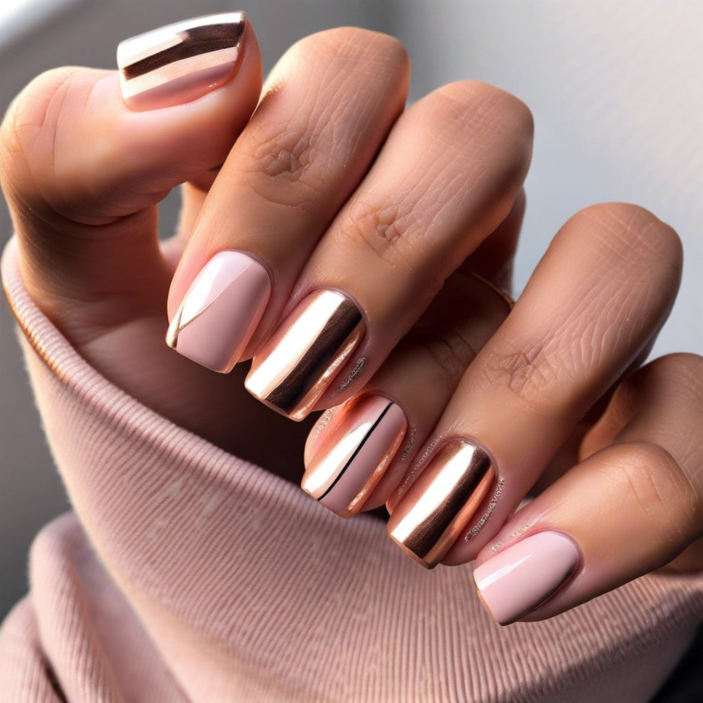 nude nails with rose gold stripes